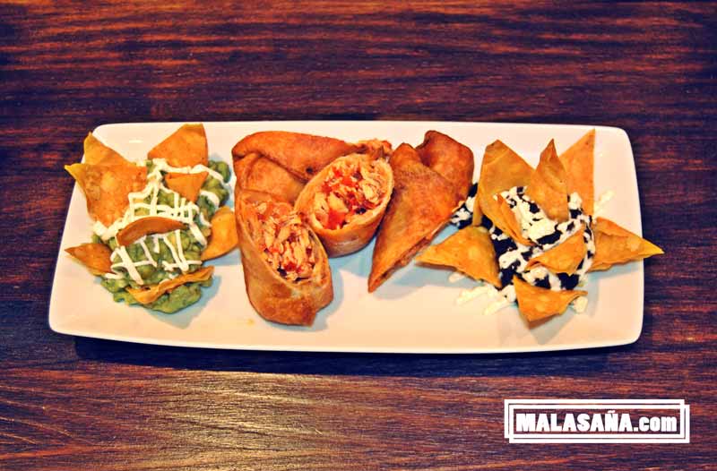 entrantes variados del restaurante, con nachos y guacamole entrantes variados del restaurante, con nachos con diferentes salsas